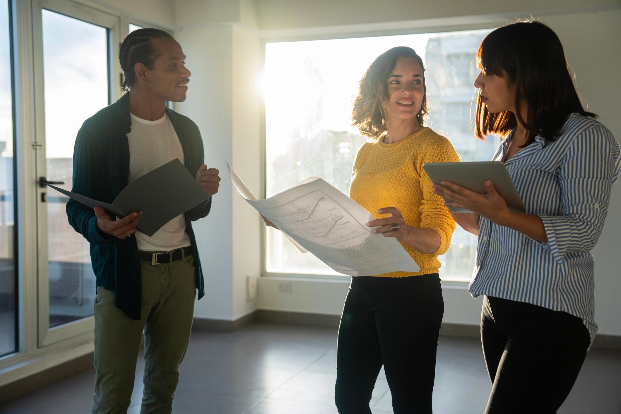 Real estate consultant presenting plans to clients